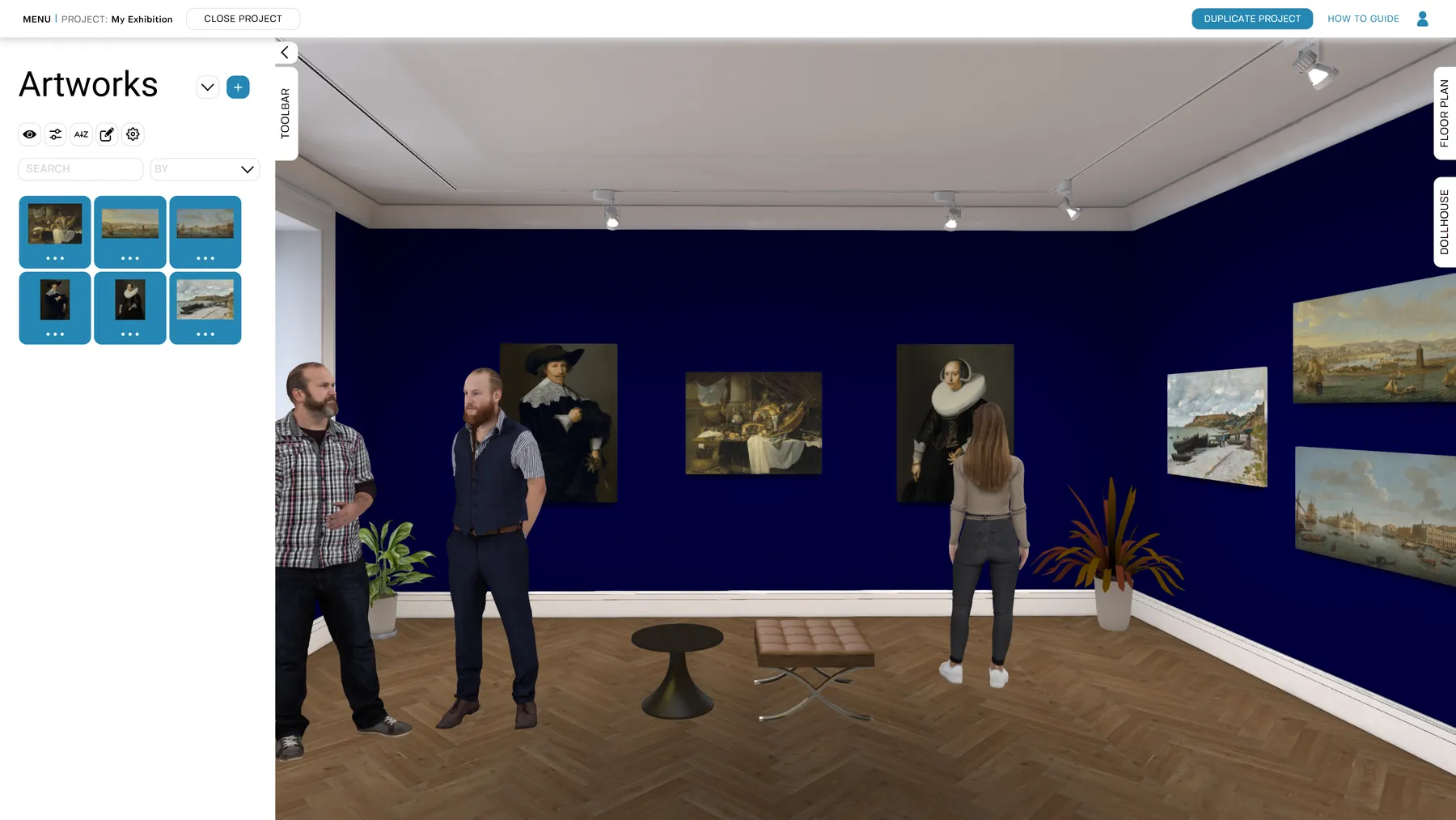 A finished Voyager exhibition with works hung on painted gallery walls